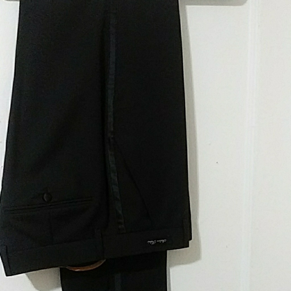 Men suit jacket $725.00 pants $289.00